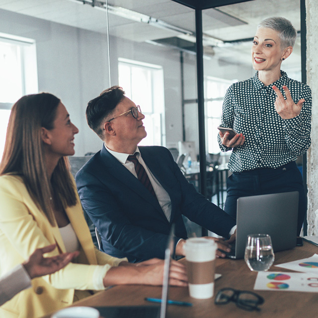 People in a meeting at a conference table