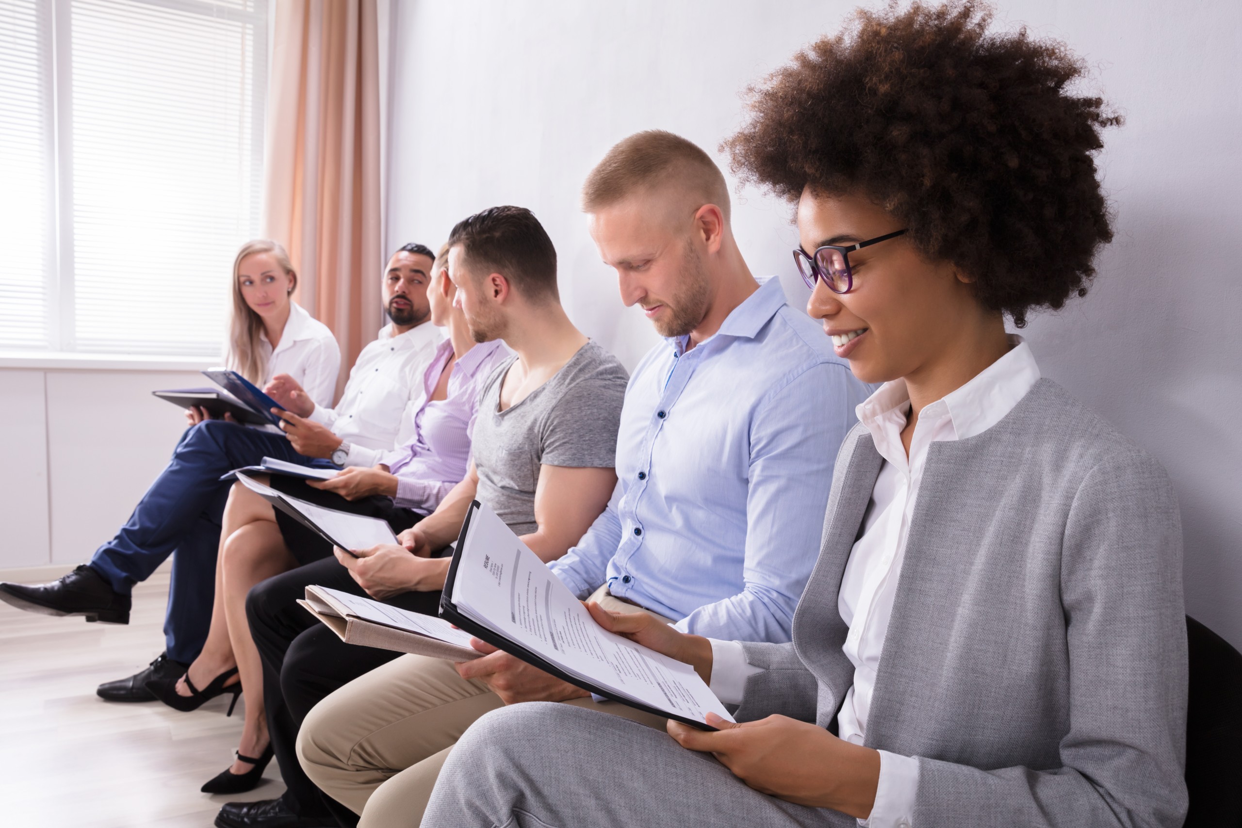 Group Of Diverse With Their Resume People Waiting For Job Interview